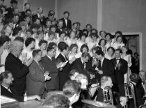 KPI akademinio choro įkūrimo 35-erių metų minėjimas, 1963 m. 2-oje eilėje (iš kairės): 1 –KPI rektorius prof. K. Baršauskas, 2- kompozitorius K. Griauzdė, 4 – choro vadovas B. Mačikėnas (KTU fotoarchyvas)