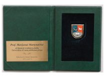 KTU Garbės ženklas prof. Marijonui Martynaičiui už ilgametį rezultatyvų darbą universiteto 85-mečio proga, 2007 m. (Originalas – KTU muziejuje)